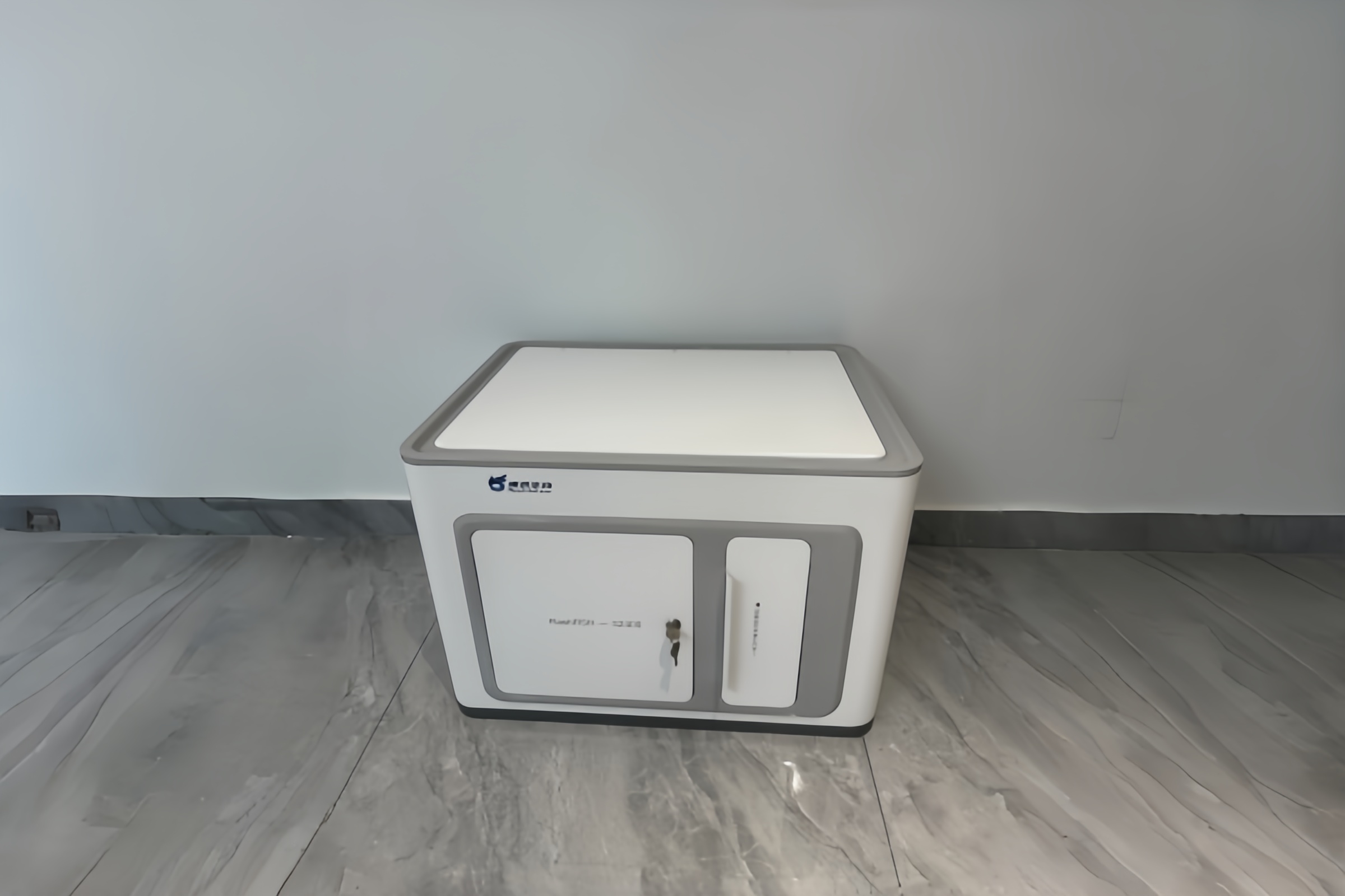Front view of the biological detection instrument enclosure manufacturing showing flawless dual-color powder coating.