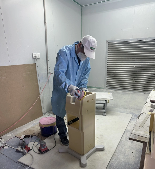 Professional manual finishing and dust-free polishing for a custom medical equipment prototype shell