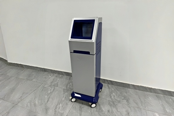Precise split-shell sheet metal assembly showing uniform gaps on the vertical physiotherapy device chassis