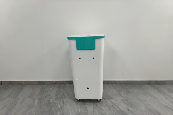 Front view of custom vertical beauty device enclosure manufacturing featuring a minimalist trapezoidal design.
