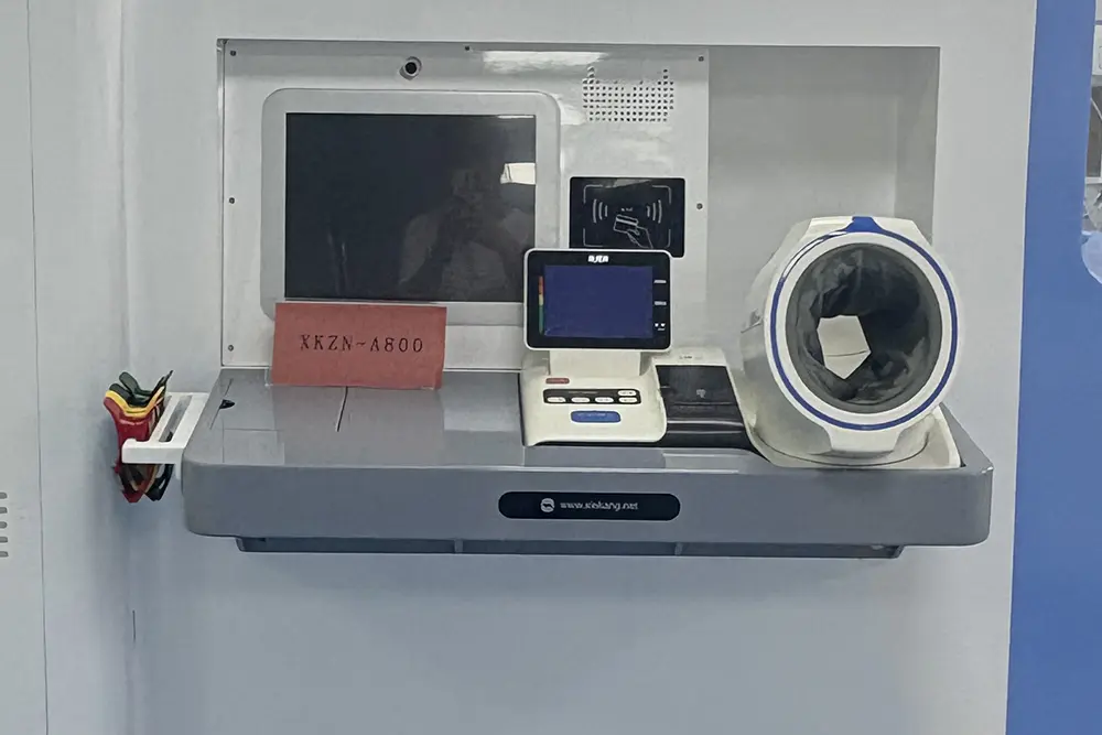 Acrylic card reader panel for healthcare kiosk enclosure